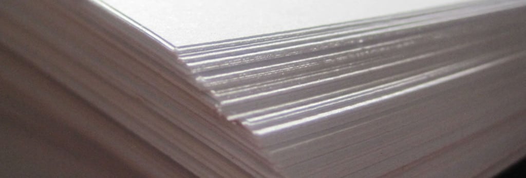 a stack of blank white papers