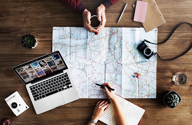 two people looking at a map